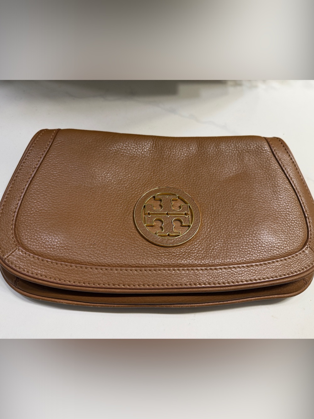 Tory Burch Tan Pebbled Leather Crossbody bag with Gold Logo